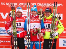 21.02.2013, Val di Fiemme, Italy (ITA): (l-r) Petter Northug (NOR), Fischer, Swix, Alpina, Rottefella, Nikita Kriukov (RUS), Rossignol, Swix, Rottefella, Adidas and Alex Harvey (CAN), Fischer, Swix, Salomon, One Way  - FIS nordic world ski championships, cross-country, individual sprint, Val di Fiemme (ITA). www.nordicfocus.com. © Laiho/NordicFocus. Every downloaded picture is fee-liable.