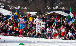 01.03.2013, Val di Fiemme, Italy (ITA): l-r: Evgeniy Belov (RUS), Daniel Richardsson (SWE) - FIS nordic world ski championships, cross-country, 4x10km men, Val di Fiemme (ITA). www.nordicfocus.com. © Felgenhauer/NordicFocus. Every downloaded picture is fee-liable.