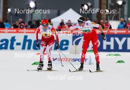 28.02.2013, Val di Fiemme, Italy (ITA):  (l-r) Paulina Maciuszek (POL), Salomon, Swix, Craft and Justyna Kowalczyk (POL), Fischer, Swix, Rottefella - FIS nordic world ski championships, cross-country, 4x5km women, Val di Fiemme (ITA). www.nordicfocus.com. © Laiho/NordicFocus. Every downloaded picture is fee-liable.