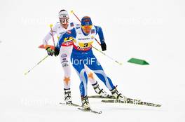 28.02.2013, Val di Fiemme, Italy (ITA): l-r: Anna Haag (SWE), Riitta-Liisa Roponen (FIN) - FIS nordic world ski championships, cross-country, 4x5km women, Val di Fiemme (ITA). www.nordicfocus.com. © Felgenhauer/NordicFocus. Every downloaded picture is fee-liable.