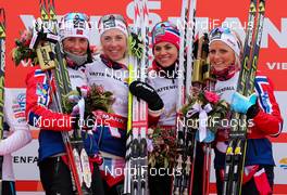 28.02.2013, Val di Fiemme, Italy (ITA):  (l-r) Marit Bjoergen (NOR), Fischer, Swix, Rottefella, Kristin Steira (NOR), Madshus, One Way, Salomon, Swix, Heidi Weng (NOR), Madshus, Swix, Alpina, Rottefella and Therese Johaug (NOR), Fischer, Swix, Salomon - FIS nordic world ski championships, cross-country, 4x5km women, Val di Fiemme (ITA). www.nordicfocus.com. © Laiho/NordicFocus. Every downloaded picture is fee-liable.
