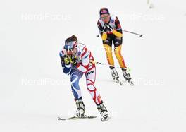 28.02.2013, Val di Fiemme, Italy (ITA): l-r: Coraline Hugue (FRA), Miriam Goessner (GER) - FIS nordic world ski championships, cross-country, 4x5km women, Val di Fiemme (ITA). www.nordicfocus.com. © Felgenhauer/NordicFocus. Every downloaded picture is fee-liable.