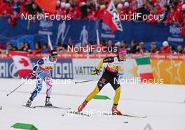 28.02.2013, Val di Fiemme, Italy (ITA):  (l-r) Anouk Faivre Picon (FRA), Madshus, Swix, Salomon, One Way and Denise Hermann (GER), Fischer, Swix, Apina, Rottefella, Adidas - FIS nordic world ski championships, cross-country, 4x5km women, Val di Fiemme (ITA). www.nordicfocus.com. © Laiho/NordicFocus. Every downloaded picture is fee-liable.