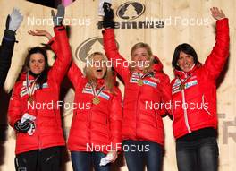 01.03.2013, Val di Fiemme, Italy (ITA):  (l-r) Heidi Weng (NOR), Madshus, Swix, Alpina, Rottefella, Therese Johaug (NOR), Fischer, Swix, Salomon, Kristin Steira (NOR), Madshus, One Way, Salomon, Swix and Marit Bjoergen (NOR), Fischer, Swix, Rottefella - FIS nordic world ski championships, cross-country, 4x5km women, Val di Fiemme (ITA). www.nordicfocus.com. © Laiho/NordicFocus. Every downloaded picture is fee-liable.