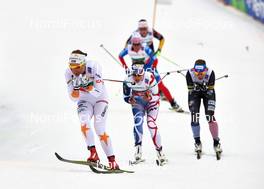 28.02.2013, Val di Fiemme, Italy (ITA): l-r: Emma Wiken (SWE), Celia Aymonier (FRA) - FIS nordic world ski championships, cross-country, 4x5km women, Val di Fiemme (ITA). www.nordicfocus.com. © Felgenhauer/NordicFocus. Every downloaded picture is fee-liable.