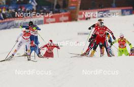 24.02.2013, Val di Fiemme, Italy (ITA): (l-r) Charlotte Kalla (SWE), Fischer, Swix, Salomon, Craft, Riikka Sarasoja-Lilja (FIN), Salomon, One Way, Craft and Ingvild Flugstad Oestberg (NOR), Madshus, Swix, Alpina, Rottefella  - FIS nordic world ski championships, cross-country, team sprint, Val di Fiemme (ITA). www.nordicfocus.com. © Laiho/NordicFocus. Every downloaded picture is fee-liable.
