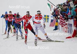 24.02.2013, Val di Fiemme, Italy (ITA): Charlotte Kalla (SWE), Fischer, Swix, Salomon, Craft followed by Ingvild Flugstad Oestberg (NOR), Madshus, Swix, Alpina, Rottefella ans Riikka Sarasoja-Lilja (FIN), Salomon, One Way, Craft  - FIS nordic world ski championships, cross-country, team sprint, Val di Fiemme (ITA). www.nordicfocus.com. © Laiho/NordicFocus. Every downloaded picture is fee-liable.