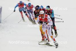 24.02.2013, Val di Fiemme, Italy (ITA):  Marcus Hellner (SWE), Fischer, Swix, Salomon, Craft followed by Tim Tscharnke (GER), Fischer, Swix, Alpina, Rottefella, Adidas  - FIS nordic world ski championships, cross-country, team sprint, Val di Fiemme (ITA). www.nordicfocus.com. © Laiho/NordicFocus. Every downloaded picture is fee-liable.