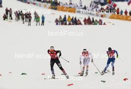 24.02.2013, Val di Fiemme, Italy (ITA): Jessica Diggins (USA), Salomon, One Way followed by Charlotte Kalla (SWE), Fischer, Swix, Salomon, Craft and Riikka Sarasoja-Lilja (FIN), Salomon, One Way, Craft  - FIS nordic world ski championships, cross-country, team sprint, Val di Fiemme (ITA). www.nordicfocus.com. © Laiho/NordicFocus. Every downloaded picture is fee-liable.