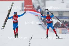 24.02.2013, Val di Fiemme, Italy (ITA):  (l-r) Alexey Petukhov (RUS), Fischer, Swix, Rottefella, Adidas and Nikita Kriukov (RUS), Rossignol, Swix, Rottefella, Adidas - FIS nordic world ski championships, cross-country, team sprint, Val di Fiemme (ITA). www.nordicfocus.com. © Laiho/NordicFocus. Every downloaded picture is fee-liable.