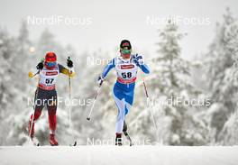 30.11.2013, Kuusamo, Finland (FIN): Chunxue Chi (CHN), Kerttu Niskanen (FIN), (l-r) - FIS world cup cross-country, 5km women, Kuusamo (FIN). www.nordicfocus.com. © Felgenhauer/NordicFocus. Every downloaded picture is fee-liable.