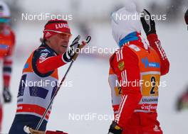 08.12.2013, Lillehammer, Norway (NOR): (l-r) Maxim Vylegzhanin (RUS), Fischer, Swix, Alpina, Rottefella, Adidas and Alexander Legkov (RUS), Rossignol, Swix, Rottefella, Adidas - FIS world cup cross-country, 4x7.5km men, Lillehammer (NOR). www.nordicfocus.com. © Laiho/NordicFocus. Every downloaded picture is fee-liable.