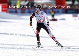 14.12.2013, Davos, Switzerland (SUI): Teresa Stadlober (AUT), Fischer, Swix, Loeffler - FIS world cup cross-country, 15km women, Davos (SUI). www.nordicfocus.com. © Laiho/NordicFocus. Every downloaded picture is fee-liable.