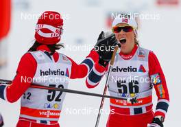14.12.2013, Davos, Switzerland (SUI): (l-r) Heidi Weng (NOR), Madshus, Swix, Alpina, Rottefella and Therese Johaug (NOR), Fischer, Swix, Rottefella - FIS world cup cross-country, 15km women, Davos (SUI). www.nordicfocus.com. © Laiho/NordicFocus. Every downloaded picture is fee-liable.
