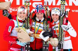14.12.2013, Davos, Switzerland (SUI): (l-r) Therese Johaug (NOR), Fischer, Swix, Rottefella, Marit Bjoergen (NOR), Fischer, Swix, Rottefella and Charlotte Kalla (SWE), Fischer, Swix, Salomon, Craft - FIS world cup cross-country, 15km women, Davos (SUI). www.nordicfocus.com. © Laiho/NordicFocus. Every downloaded picture is fee-liable.