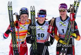 15.12.2013, Davos, Switzerland (SUI): (l-r) Marit Bjoergen (NOR), Fischer, Swix, Rottefella, Kikkan Randall (USA), Fischer, Swix, Salomon and Denise Hermann (GER), Fischer, Swix, Apina, Rottefella, Adidas  - FIS world cup cross-country, individual sprint, Davos (SUI). www.nordicfocus.com. © Laiho/NordicFocus. Every downloaded picture is fee-liable.