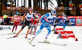 22.12.2013, Asiago, Italy (ITA): Denise Herrmann (GER), Anne Kylloenen (FIN), (l-r) - FIS world cup cross-country, team sprint, Asiago (ITA). www.nordicfocus.com. © Felgenhauer/NordicFocus. Every downloaded picture is fee-liable.
