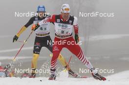 05.01.2013, Schonach, Germany (GER): l-r: Tino Edelmann (GER), Madshus, Leki, Rottefella, Adidas,  Christoph Bieler (AUT), Madshus, Leki, Rottefella, Loeffler - FIS world cup nordic combined, team HS106/4x5km, Schonach (GER). www.nordicfocus.com. © Domanski/NordicFocus. Every downloaded picture is fee-liable.