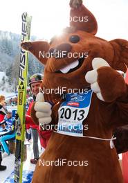 22.02.2013, Val di Fiemme, Italy (ITA): (l-r) the winner of the ski jumping Haavard Klemetsen (NOR), Fischer, Swix, Alpina, Rottefella and the official mascot Skiri  - FIS nordic world ski championships, nordic combined, individual gundersen HS106/10km, Val di Fiemme (ITA). www.nordicfocus.com. © Laiho/NordicFocus. Every downloaded picture is fee-liable.