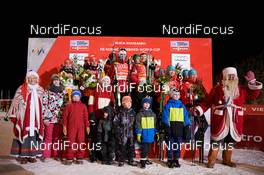 01.12.2013, Kuusamo, Finland (FIN): Team Germany, Team Norway, Team Japan (l-r), Santa Claus and children - FIS world cup nordic combined, team HS142/4x5km, Kuusamo (FIN). www.nordicfocus.com. © Felgenhauer/NordicFocus. Every downloaded picture is fee-liable.