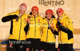 24.02.2013, Val di Fiemme, Italy (ITA):  (l-r) Severin Freund (GER), Fischer, Ulrike Graessler (GER), Fischer, Carina Vogt (GER), Fischer and Richard Freitag (GER), Fischer - FIS nordic world ski championships, ski jumping, mixed team HS106, Val di Fiemme (ITA). www.nordicfocus.com. © Laiho/NordicFocus. Every downloaded picture is fee-liable.