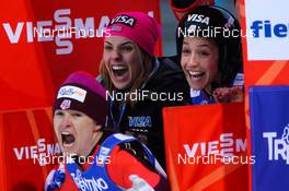 22.02.2013, Val di Fiemme, Italy (ITA): (l-r) Lindsey Van (USA), Abby Hughes (USA) and Jessica Jerome (USA), Fischer  - FIS nordic world ski championships, ski jumping ladies, individual HS106, Val di Fiemme (ITA). www.nordicfocus.com. © Laiho/NordicFocus. Every downloaded picture is fee-liable.