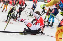 05.01.2014, Oberhof, Germany (GER): Simon Eder (AUT) falls after the start - IBU world cup biathlon, mass men, Oberhof (GER). www.nordicfocus.com. © Manzoni/NordicFocus. Every downloaded picture is fee-liable.