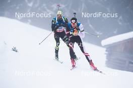 18.01.2014, Antholz, Italy (ITA): Friedrich Pinter (AUT), Simon Fourcade (FRA) - IBU world cup biathlon, pursuit men, Antholz (ITA). www.nordicfocus.com. © Manzoni/NordicFocus. Every downloaded picture is fee-liable.