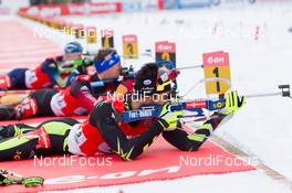 19.01.2014, Antholz, Italy (ITA): Martin Fourcade (FRA), Eric Lesser (GER), Carl-Johan Bergman (SWE) - IBU world cup biathlon, relay men, Antholz (ITA). www.nordicfocus.com. © Manzoni/NordicFocus. Every downloaded picture is fee-liable.