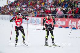 19.01.2014, Antholz, Italy (ITA): Alexis Boeuf (FRA), Simon Fourcade (FRA) - IBU world cup biathlon, relay men, Antholz (ITA). www.nordicfocus.com. © Manzoni/NordicFocus. Every downloaded picture is fee-liable.