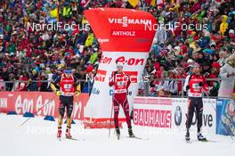 19.01.2014, Antholz, Italy (ITA): Andreas Birnbacher  (GER), Henrik l'Abee-Lund (NOR), Scott Perras (CAN) - IBU world cup biathlon, relay men, Antholz (ITA). www.nordicfocus.com. © Manzoni/NordicFocus. Every downloaded picture is fee-liable.