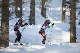 06.03.2014, Pokljuka, Slovenia (SLO): Darya Domracheva (BLR), Irene Cadurisch (SUI) - IBU world cup biathlon, sprint women, Pokljuka (SLO). www.nordicfocus.com. © Manzoni/NordicFocus. Every downloaded picture is fee-liable.
