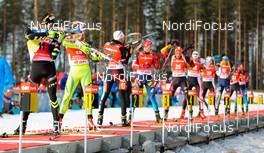16.03.2014, Kontiolahti, Finland (FIN): group of skiers athe shooting range - IBU world cup biathlon, pursuit men, Kontiolahti (FIN). www.nordicfocus.com. © Laiho/NordicFocus. Every downloaded picture is fee-liable.