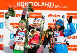 16.03.2014, Kontiolahti, Finland (FIN): (l-r) Darya Domracheva (BLR), Fischer, Rottefella, Leki, Kaisa Maekaeraeinen (FIN), Fischer, Leki, Rottefella, Odlo and Olga Zaitseva (RUS), Rossignol, Rottefella,Leki, adidas - IBU world cup biathlon, pursuit women, Kontiolahti (FIN). www.nordicfocus.com. © Laiho/NordicFocus. Every downloaded picture is fee-liable.
