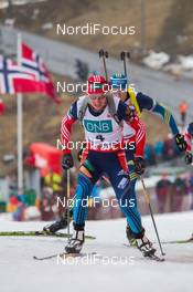 22.03.2014, Oslo, Norway (NOR): Alexander Loginov (RUS) - IBU world cup biathlon Holmenkollen, pursuit men, Oslo (NOR). www.nordicfocus.com. © Manzoni/NordicFocus. Every downloaded picture is fee-liable.
