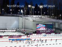 17.02.2014, Sochi, Russia (RUS): women's start with shooting range in the background - XXII. Olympic Winter Games Sochi 2014, biathlon, mass women, Sochi (RUS). www.nordicfocus.com. © NordicFocus. Every downloaded picture is fee-liable.