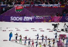17.02.2014, Sochi, Russia (RUS): Event Feature: The athletes line up for the start - XXII. Olympic Winter Games Sochi 2014, biathlon, mass women, Sochi (RUS). www.nordicfocus.com. © NordicFocus. Every downloaded picture is fee-liable.