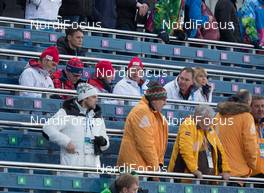 21.02.2014, Sochi, Russia (RUS): Event Feature: Norwegians King Harald and the Queen Sonja discuss on the grandstand - XXII. Olympic Winter Games Sochi 2014, biathlon, relay women, Sochi (RUS). www.nordicfocus.com. © NordicFocus. Every downloaded picture is fee-liable.