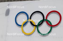 07.02.2014, Sochi, Russia (RUS): The olympic Rings with the shadow of a cable car - XXII. Olympic Winter Games Sochi 2014, biathlon, training, Sochi (RUS). www.nordicfocus.com. © NordicFocus. Every downloaded picture is fee-liable.
