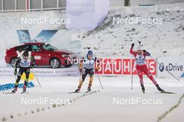 30.11.2014, Oestersund, Sweden (SWE):  Martin Fourcade (FRA), Simon Schempp (GER), Lars Helge Birkeland (NOR) - IBU world cup biathlon, relay mixed, Oestersund (SWE). www.nordicfocus.com. © Manzoni/NordicFocus. Every downloaded picture is fee-liable.