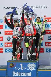 30.11.2014, Oestersund, Sweden (SWE):  Simon Fourcade (FRA), Anais Bescond (FRA), Anais Chevalier (FRA), Martin Fourcade (FRA) - IBU world cup biathlon, relay mixed, Oestersund (SWE). www.nordicfocus.com. © Manzoni/NordicFocus. Every downloaded picture is fee-liable.