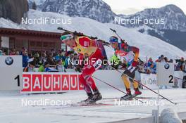 14.12.2014, Hochfilzen, Austria (AUT): Emil Hegle Svendsen (NOR), Simon Schempp (GER) - IBU world cup biathlon, pursuit men, Hochfilzen (AUT). www.nordicfocus.com. © Manzoni/NordicFocus. Every downloaded picture is fee-liable.