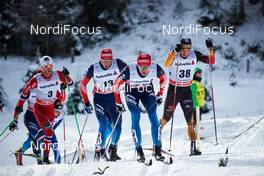01.01.2014, Lenzerheide, Switzerland (SUI): Martin Johnsrud Sundby (NOR), Alexander Legkov (RUS), Stanislav Volzhentsev (RUS), Thomas Bing (GER), (l-r) - FIS world cup cross-country, tour de ski, mass men, Lenzerheide (SUI). www.nordicfocus.com. © Felgenhauer/NordicFocus. Every downloaded picture is fee-liable.