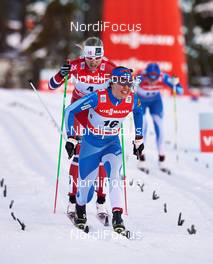 01.01.2014, Lenzerheide, Switzerland (SUI): Astrid Uhrenholdt Jacobsen (NOR), Kerttu Niskanen (FIN), (l-r) - FIS world cup cross-country, tour de ski, mass women, Lenzerheide (SUI). www.nordicfocus.com. © Felgenhauer/NordicFocus. Every downloaded picture is fee-liable.