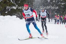 01.02.2014, Toblach, Italy (ITA): Dmitriy Japarov (RUS), Jonas Baumann (SUI) - FIS world cup cross-country, 15km men, Toblach (ITA). www.nordicfocus.com. © Manzoni/NordicFocus. Every downloaded picture is fee-liable.