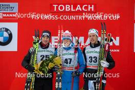 01.02.2014, Toblach, Italy (ITA): Dario Cologna (SUI), Alexander Legkov (RUS), Marcus Hellner (SWE) - FIS world cup cross-country, 15km men, Toblach (ITA). www.nordicfocus.com. © Manzoni/NordicFocus. Every downloaded picture is fee-liable.