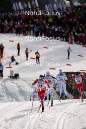 08.03.2014, Oslo, Norway (NOR): Simen Oestensen (NOR), Atomic, KV+ followed by Lars Nelson (SWE), Rossignol, Skigo, Rottefella, Craft - FIS world cup cross-country, mass men, Oslo (NOR). www.nordicfocus.com. © Laiho/NordicFocus. Every downloaded picture is fee-liable.