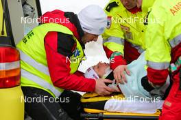 09.03.2014, Oslo, Norway (NOR): Astrid Jacobsen (NOR) crashed in a downhill and will be transported by the rescue crew - FIS world cup cross-country, mass women, Oslo (NOR). www.nordicfocus.com. © Laiho/NordicFocus. Every downloaded picture is fee-liable.
