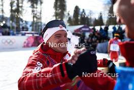 14.02.2014, Sochi, Russia (RUS): Dario Cologna (SUI) celebrates with the team - XXII. Olympic Winter Games Sochi 2014, cross-country, 15km men, Sochi (RUS). www.nordicfocus.com. © NordicFocus. Every downloaded picture is fee-liable.