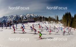 23.02.2014, Sochi, Russia (RUS): group of skiers during the first lap - XXII. Olympic Winter Games Sochi 2014, cross-country, 50km men, Sochi (RUS). www.nordicfocus.com. © NordicFocus. Every downloaded picture is fee-liable.